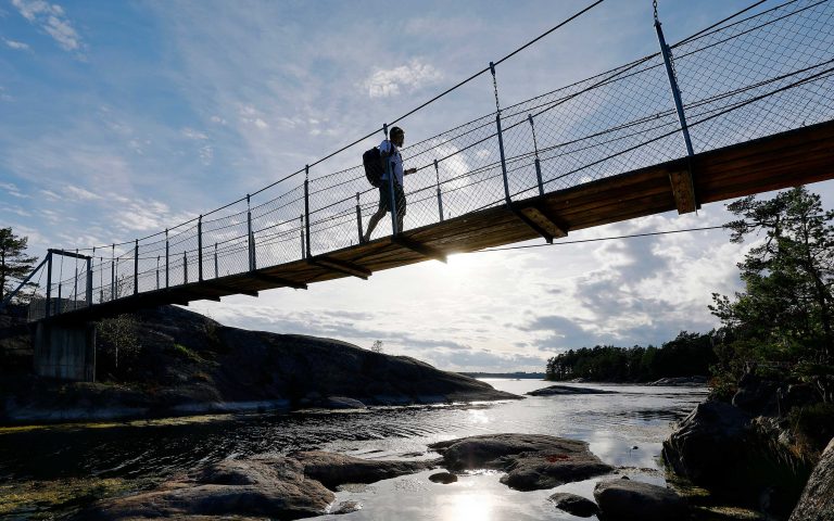 Man walking an bridge at Stendörren